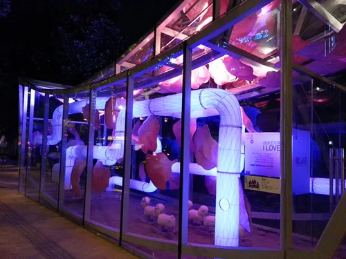 Colour and light within the street-side structure.